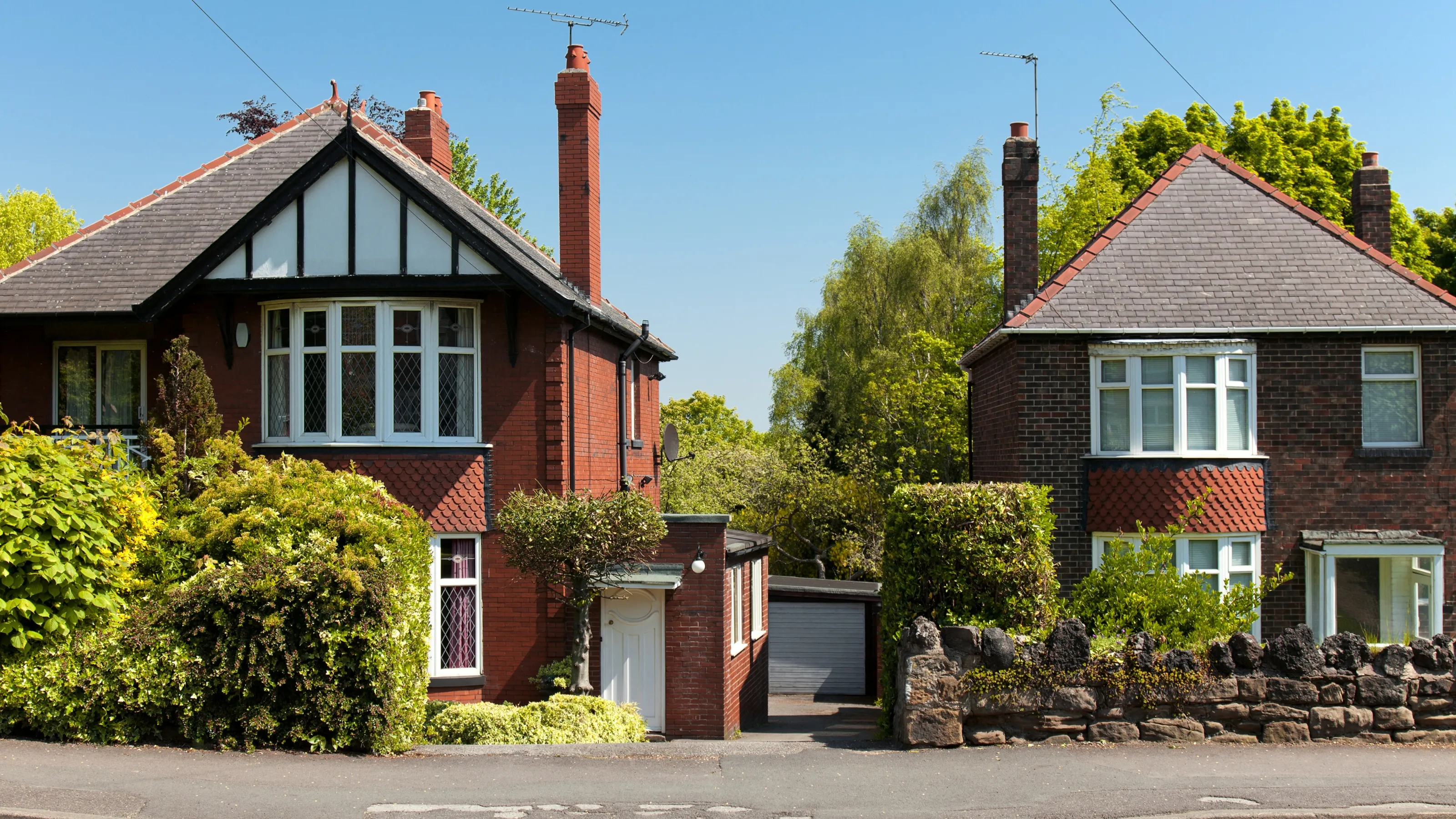 Detached UK houses of the kind owners weigh up between short lets and tenancies