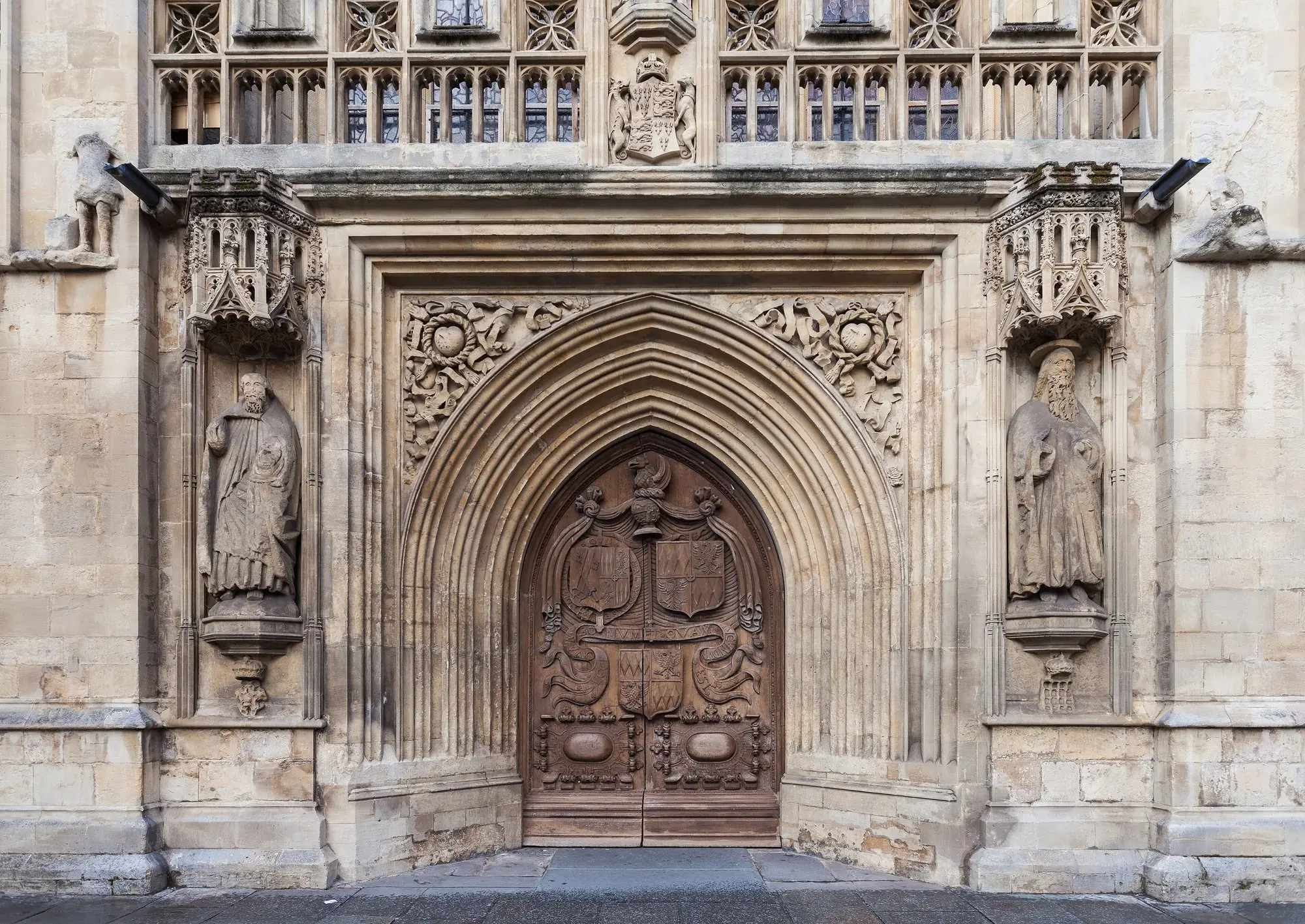 The carved stone west door of Bath Abbey